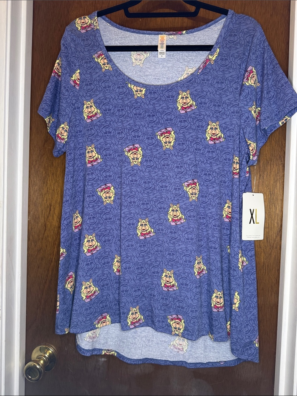 LuLaRoe Scoop Neck Tee in Purple with Yellow & Pink Character Print - XL